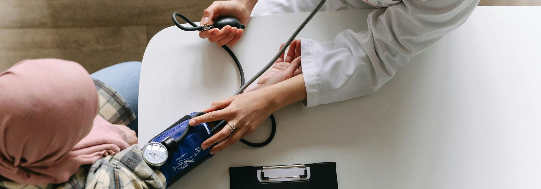 patient gettiing blood pressure checked